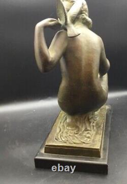 # Bronze femme aux colombes art nouveau signée UGO CIPRIANI (1887-1960)