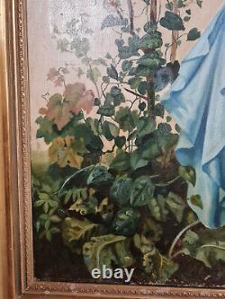 Grande huile sur toile époque Art Nouveau jeune femme dans un paysage fleuris
