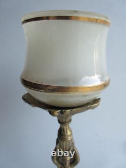 Pied de lampe Art Nouveau, bronze doré, Femme tenant sur sa tête une lampe