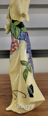 Statue de femme en porcelaine Art Nouveau signée Décors du Galion