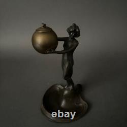 Statuette 1900 Art Nouveau en étain ou régule femme portant une boule M3433