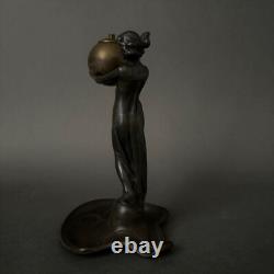 Statuette 1900 Art Nouveau en étain ou régule femme portant une boule M3433