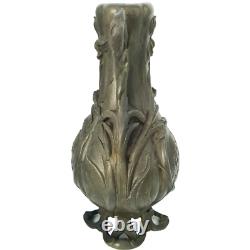 Vase sculpté art nouveau visages de femmes et fleurs en métal ou régule
