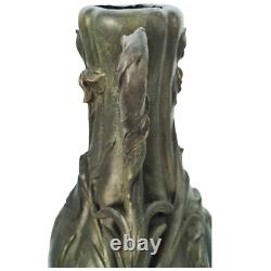 Vase sculpté art nouveau visages de femmes et fleurs en métal ou régule