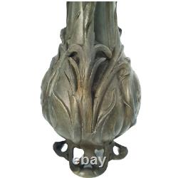 Vase sculpté art nouveau visages de femmes et fleurs en métal ou régule