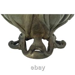 Vase sculpté art nouveau visages de femmes et fleurs en métal ou régule